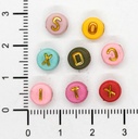 Plástico letras planas 7mm pastel c/dorado x 10grs.