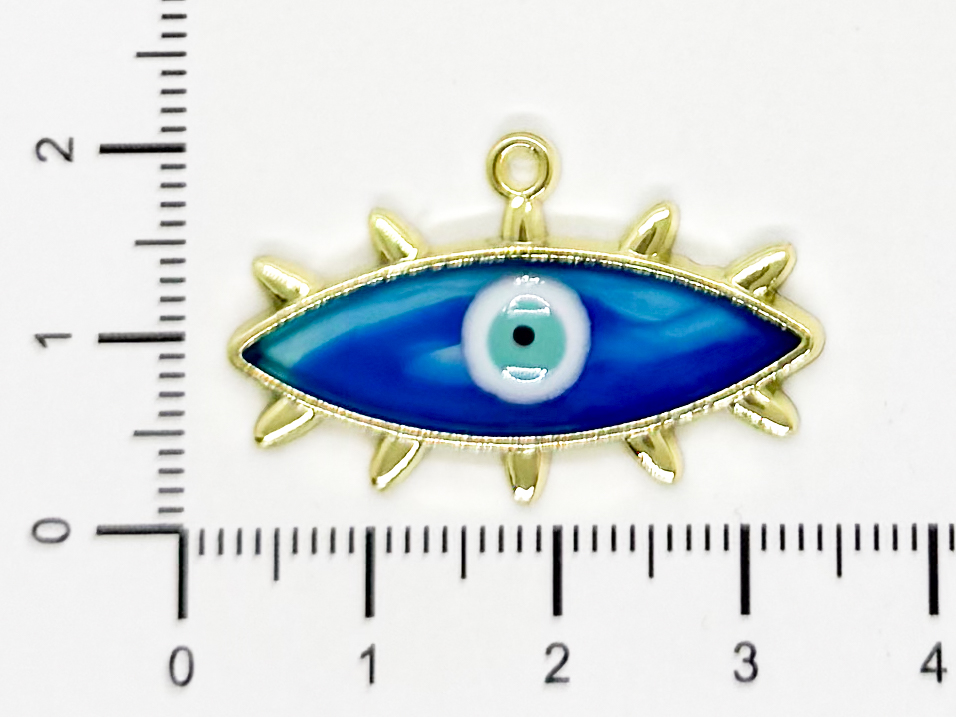 Dije esmaltado ojos azules pestañas x 1un
