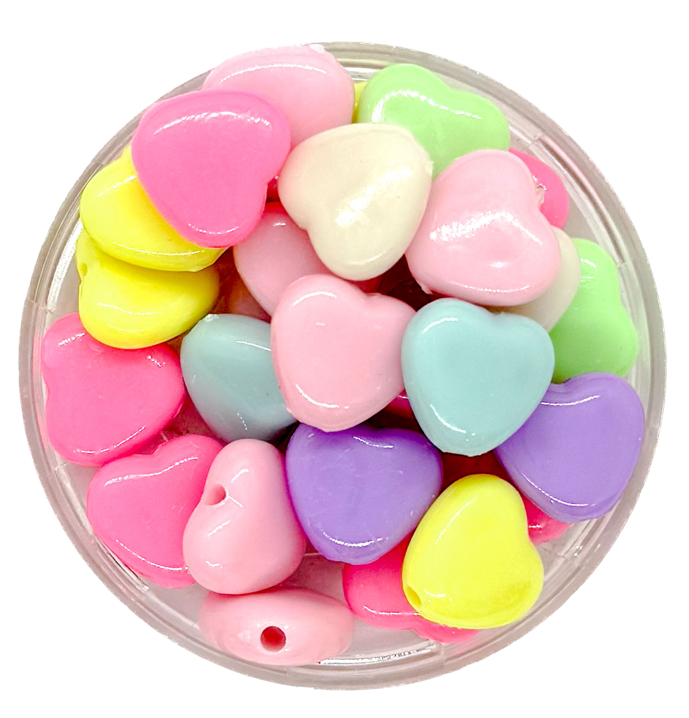  Plástico infantil pastel corazón liso 12mm x 10gr.