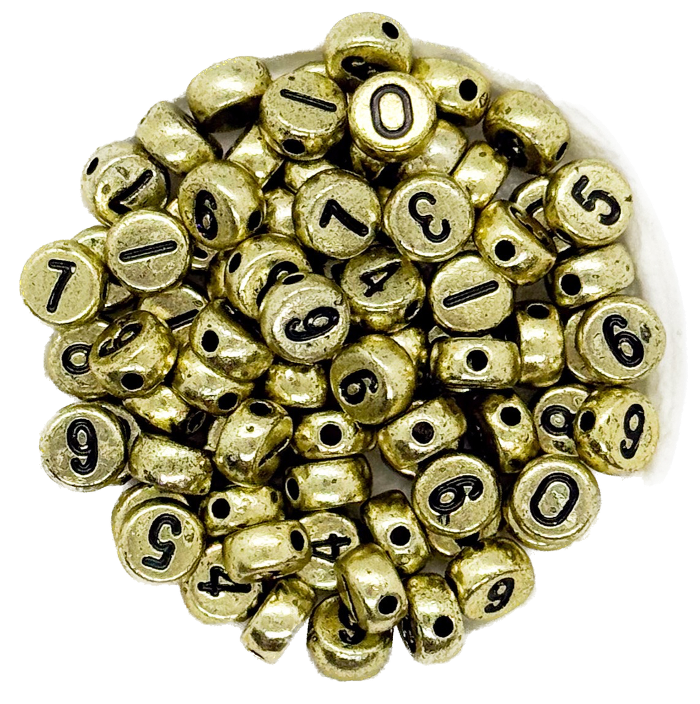 Plástico números plano 7mm dorado x 10 grs.