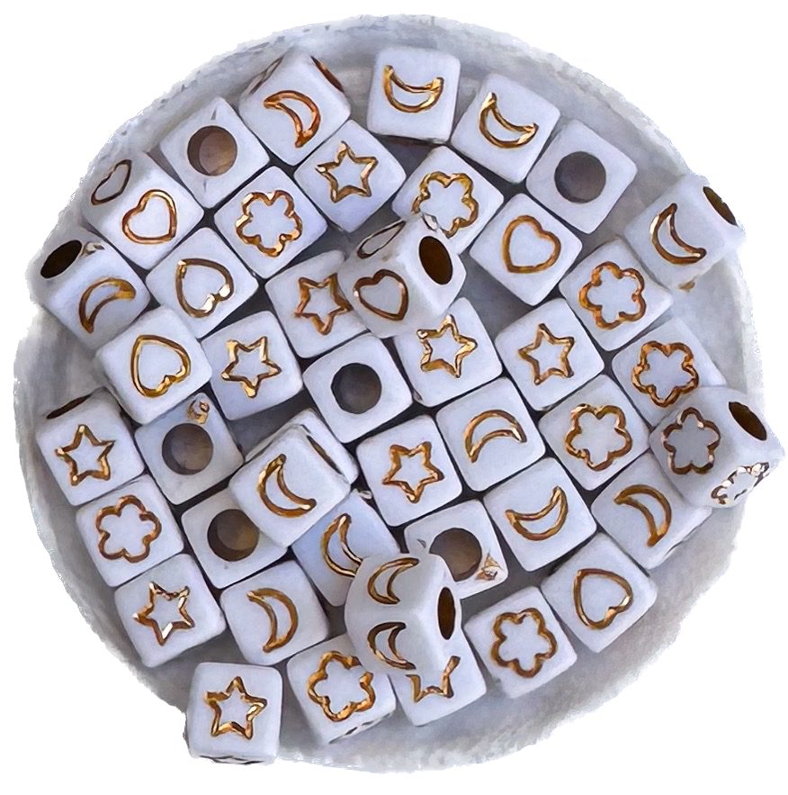 Plástico figuras surtidas cubo 7mm blanco c/dorado x 10g