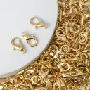 Mosquetón hierro 12mm dorado rose