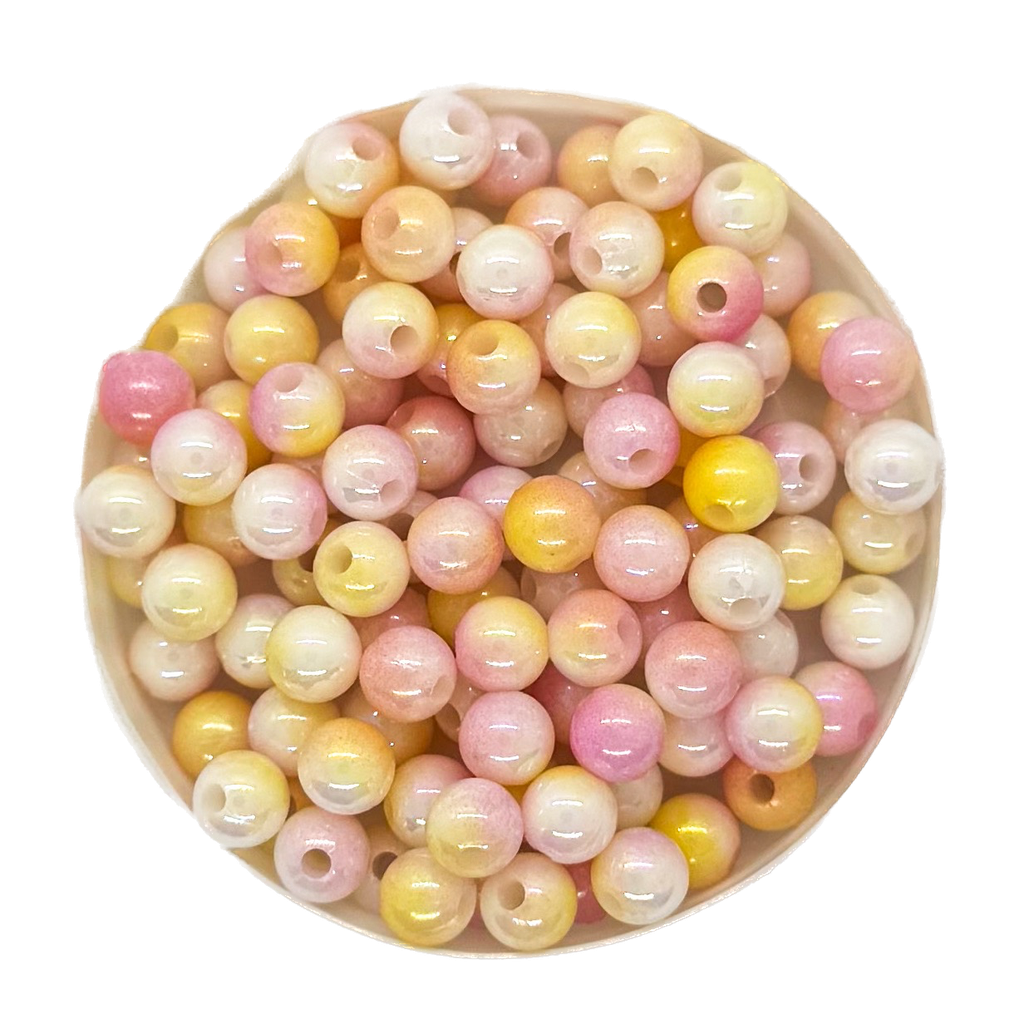 Perla plástica marmolada 6mm naranja x 10g