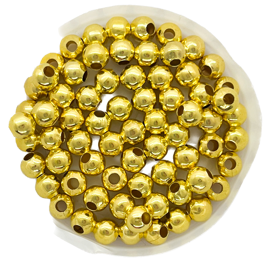 Bolitas metálicas doradas 8mm x 20 grs. 