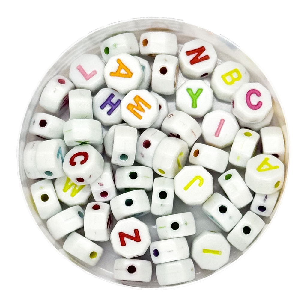 Plástico letras octogonal 7mm b/color x 10grs.