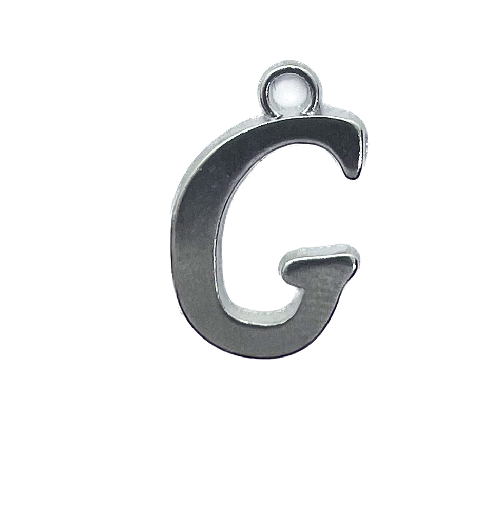 Dijes de fundición letra G x 10gr 