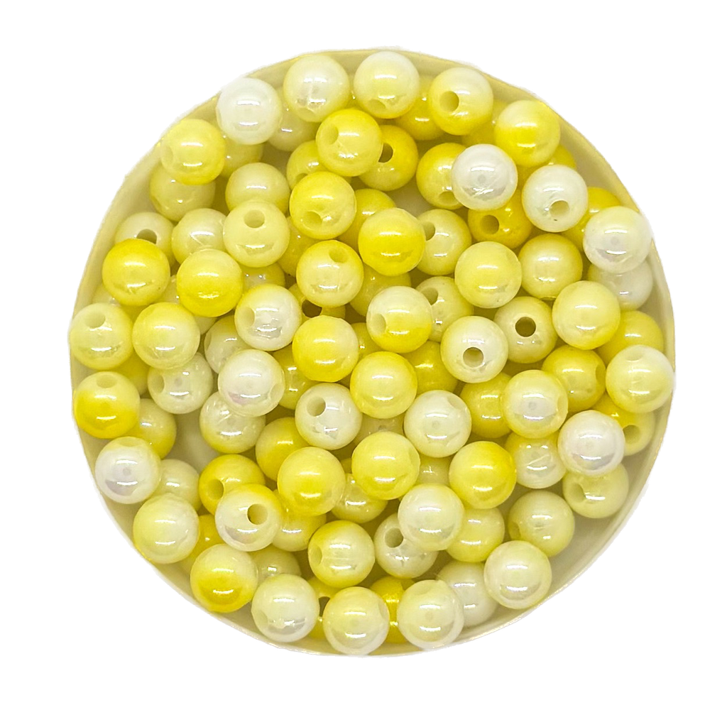 Perla plástica marmolada 6mm amarilla x 10g