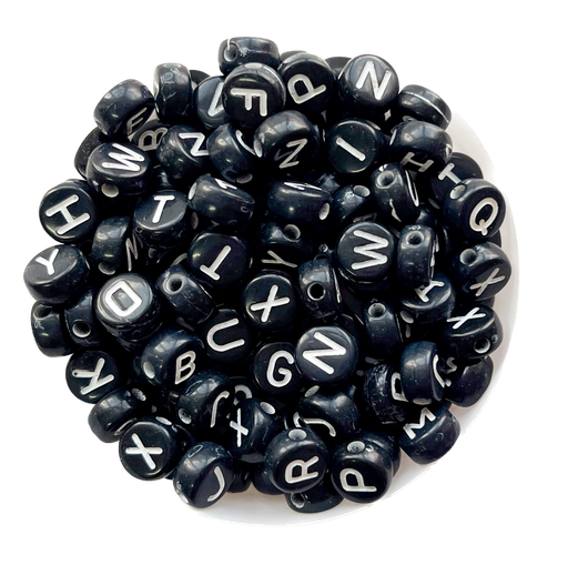 [12100] Plástico letras planas 7 mm n/b x 10gr.